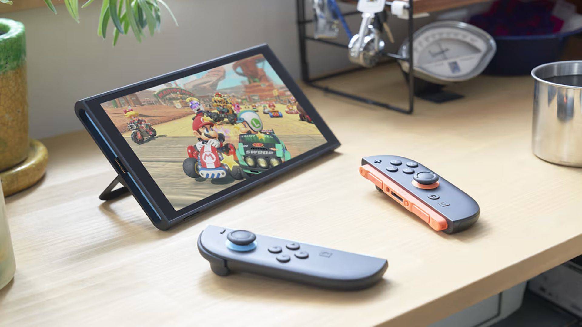 任天堂Switch OLED掌机搭配Joy-Con展示图